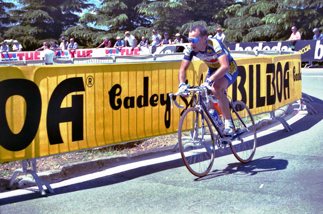 Italy's Olympic champion Paolo Bettini, left, looks at his